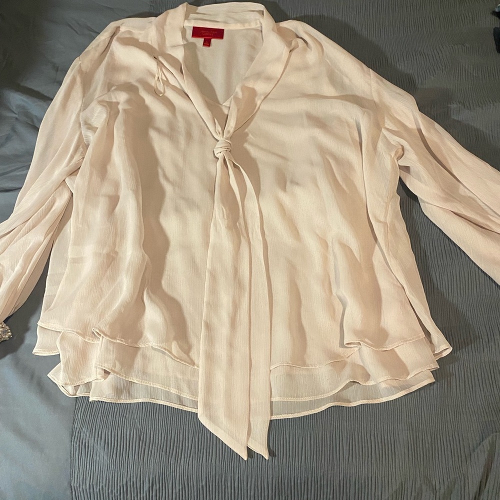 JLo offwhite long sleeve business top with a cuff sleeve pearl detail.